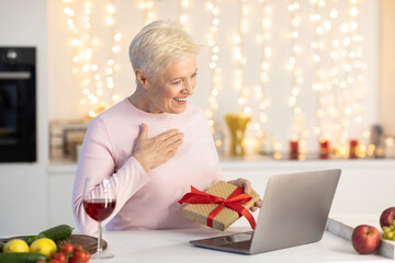 Senior Woman Having Video Call On Christmas At Home