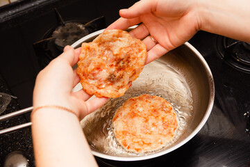 Frying the burgers in the turkey breast burger pan
