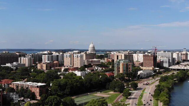 Madison, Wisconsin USA, Drone Aerial View of Downtown Cityscape on Sunny Summer Day. Pedestal Drone Shot