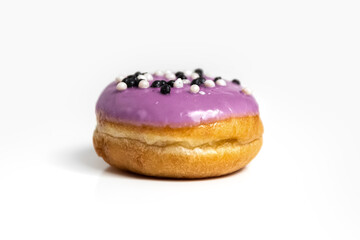A bun covered with glaze on a white background. Isolate. 