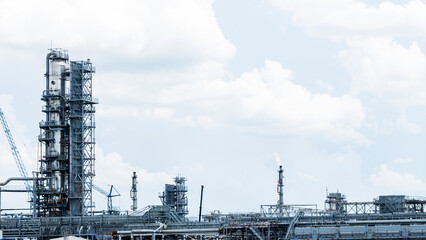 Refinery process area of petrochemical plant on dramatic sky background. Industrial concept.