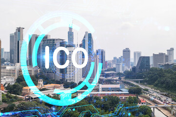 ICO icon hologram over panorama city view of Kuala Lumpur. KL is the hub of blockchain projects in...