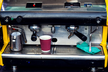 Coffee machine in cafe in proccess of using