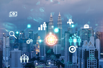 Research and technological development glowing icons. Night panoramic city view of Kuala Lumpur. Concept of innovative activities expanding new services or products in Malaysia, Asia. Double exposure.