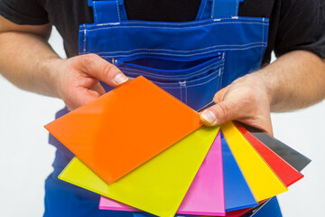 Pieces of colored glass for interior decoration kept by a professional glazier