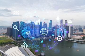Social media icons hologram over panorama city view of Singapore, Asia. The concept of people networking and connections. Double exposure.