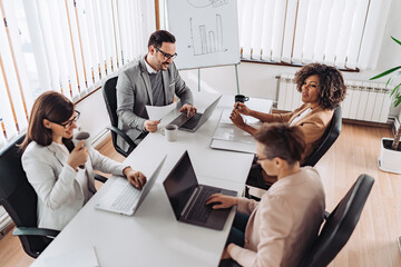 Business people sitting at the conference room and discussing