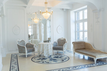 beautiful stylish chic rich clean bright blank interior. high white walls with large windows from floor the pattern on the floor