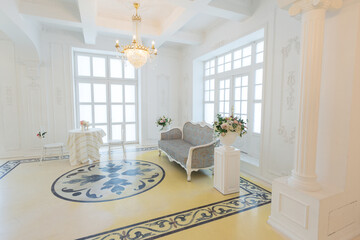 beautiful stylish chic rich clean bright blank interior. high white walls with large windows from floor the pattern on the floor