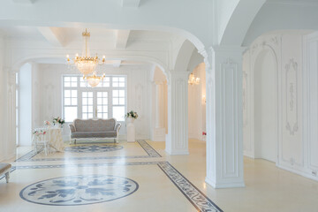 Obraz premium beautiful stylish chic rich clean bright blank interior. high white walls with large windows from floor the pattern on the floor