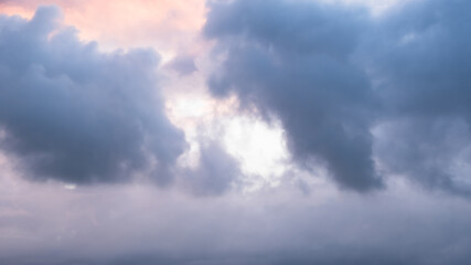 Panoramic view of pink clouds in sunset sky