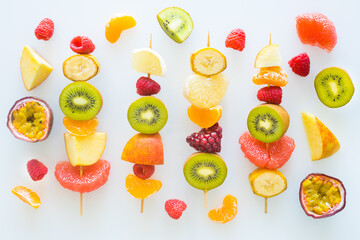 Full of vitamins, juicy fruit skewers The concept of healthy eating and diet, White background