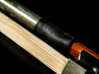 close up macro of a violin horsehair bow