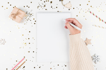 Holiday background with white Notepad for notes