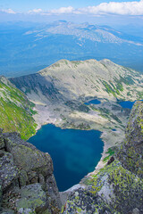 Fototapeta na wymiar Spectacular view of blue lake in mountain valley