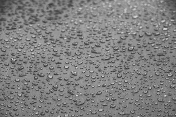 Water drops on smooth surface of waterproof fabric
