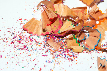 Naklejka premium Coloured Pencil Shavings on White Background