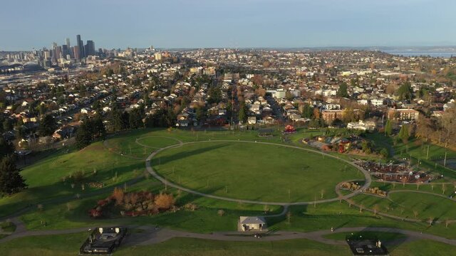 Aerial  drone tracking footage of Jefferson Park, Mt. Baker from South Seattle, with downtown Seattle, Mercer Island, North Beacon Hill, Lake Washington in King County, Washington