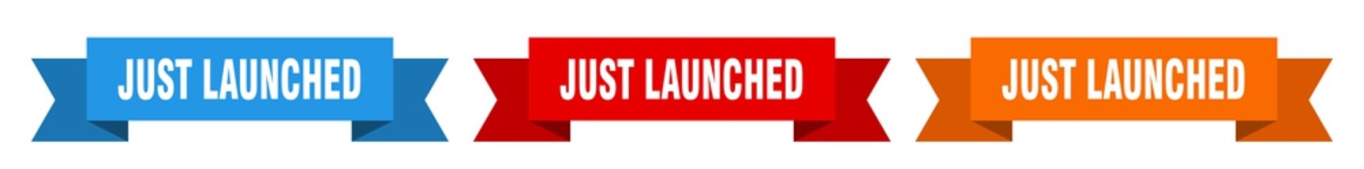 just launched ribbon. just launched isolated paper sign. banner