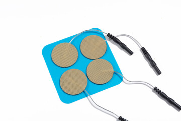 A set of four electrodes for tens unit used in pain treatment with a white background