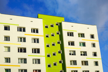 a fragment of the facade of an apartment building that has just been renovated