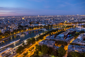 Fototapeta na wymiar Aerial view of Paris and the Seine River at sunset