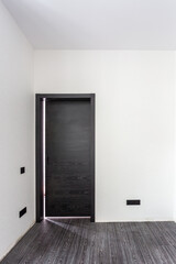 black wooden door in dark style color for modern interior and apartments flat or office