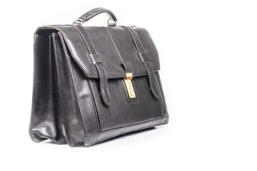 Studio lighting. on a white background an old shabby black briefcase. Close-up