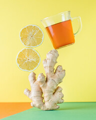 tea with lemon and ginger hot beverage drink ready to eat on the table healthy meal snack...