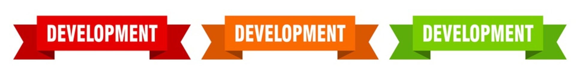development ribbon. development isolated paper sign. banner