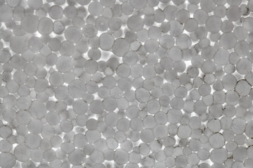 White Styrofoam Background Texture.Closeup detail of white abstract polystyrene foam texture background.
