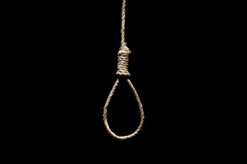 Hangman's loop on the black background. Capital punishment, suicide attempt and death penalty by hanging concept with rope tied into a noose isolated on black background. - 397659604