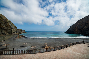 Quiet beach of stones and black sand in La Gomera. Canary Islands.