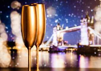 champagne glasses and fireworks  new year in London