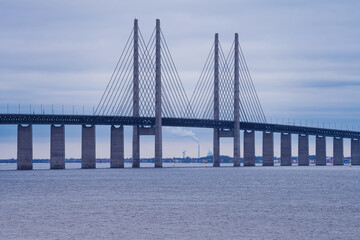 The Sound Bridge, the bridge and underwater tunnel connecting Malmo, Sweden with Copenhagen, Denmark. Blue sky and water in the background