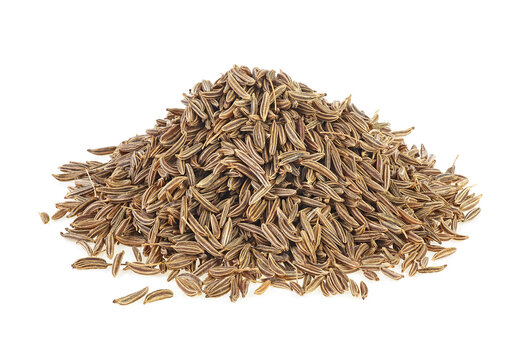 Pile of cumin seeds isolated on a white background. Dried cumin seeds. Caraway.