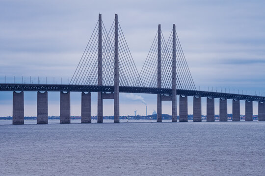 The Sound Bridge, the bridge and underwater tunnel connecting Malmo, Sweden with Copenhagen, Denmark. Blue sky and water in the background