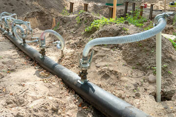 drainage system for pumping out groundwater out of the ground. Water pumping station. A set of...