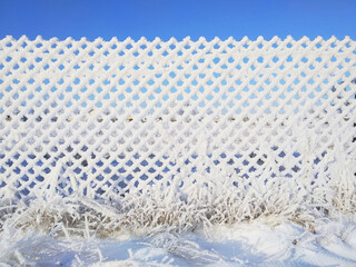 snow covered fence palisade paling