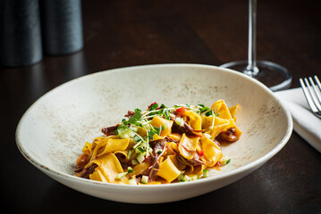 Tagliatelle with oxtail and herbs