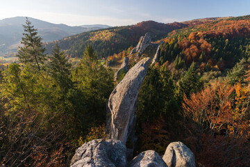 Rocks in Tustan, carpathian wood in autumn