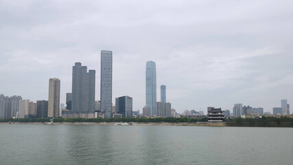 Fototapeta na wymiar View of skyscrapers, skyline. Xiang River view from Orange Island in Changsha, capital of Hunan Province. China, Asia 