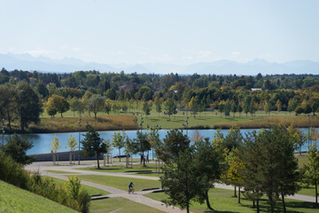 Beautiful panoramic landscape with a lake and trees in the green 