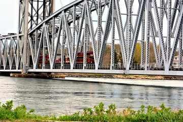 Cape cod railroad bridge with a train crossing