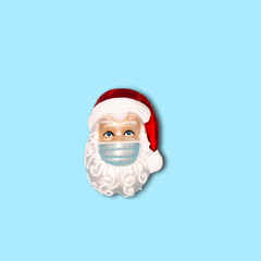 Christmas ornament Santa Claus wearing face mask Coronavirus health care