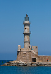 Fototapeta na wymiar Lighthouse at Chania harbour on Crete