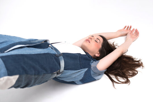 female model posing on white background