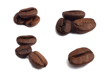 Various options for piles of several three roasted arabica coffee beans and one bean too, side view with a large bokeh in daylight, macrophotography