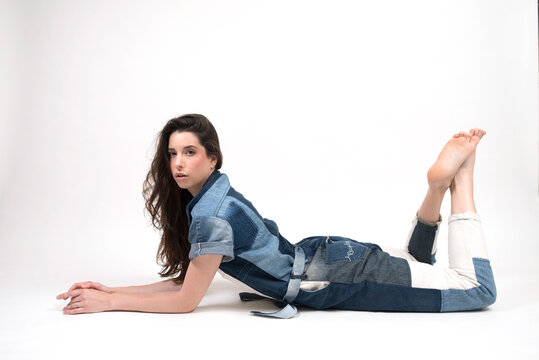 female model posing on white background