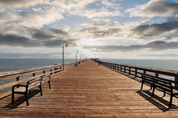 View of historic Ventura pier with sunset sky near Los Angeles, California. 